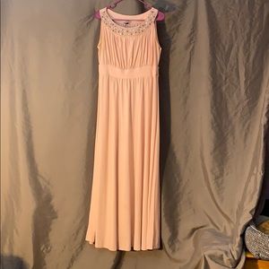 Full length, light pink dress.